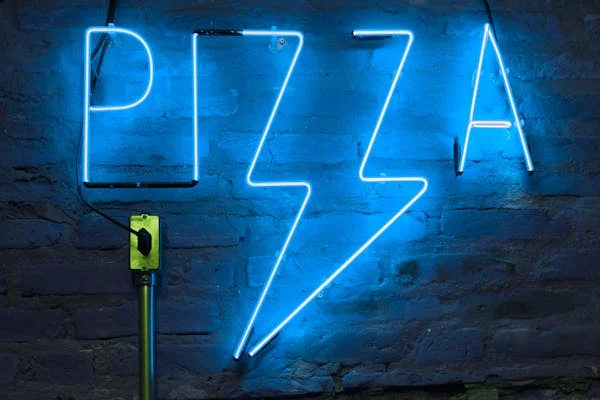 Your brand story is a powerful tool for connecting with customers on an emotional level. It should articulate the origins of your pizzeria, your passion for pizza, and the values that drive your business.